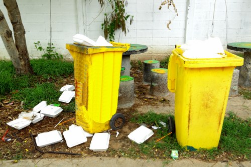 Modern waste transportation vehicles in Enfield