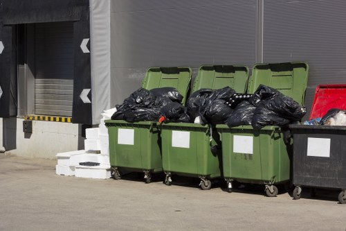 Team members sorting items during a house clearance